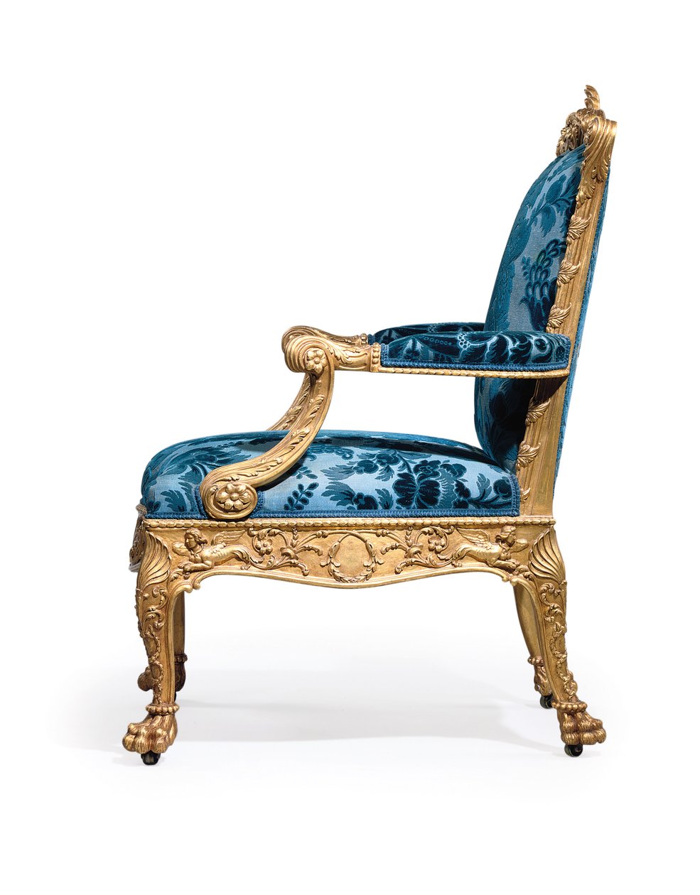 En af et par George III lænestole af forgyldt træ af Robert Adam