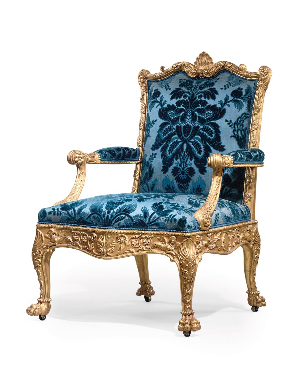 En af et par George III lænestole af forgyldt træ af Robert Adam