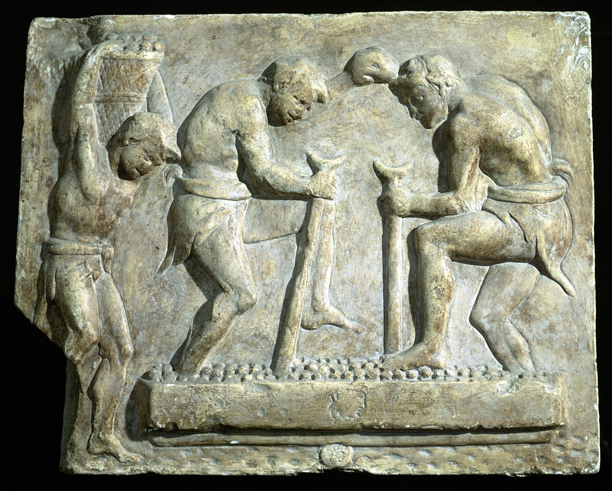 Relief forestillende brolæggere af Roman