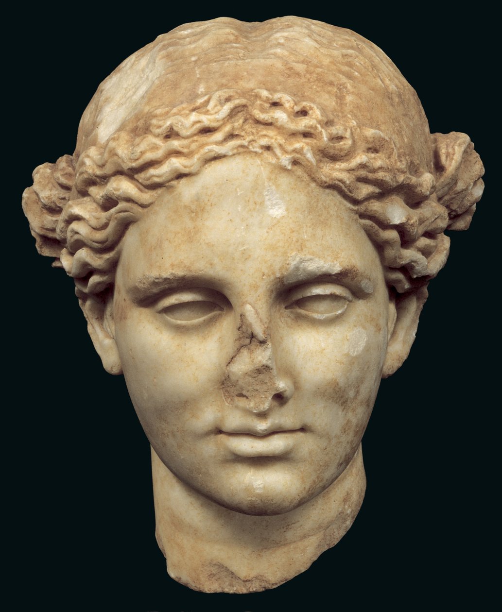 Hovedet af Apollo Sauroktonos (firbendræberen) kopi af en græsk bronze fra det 4. århundrede af Praxiteles, fundet i Kifissia (marmor) af Roman