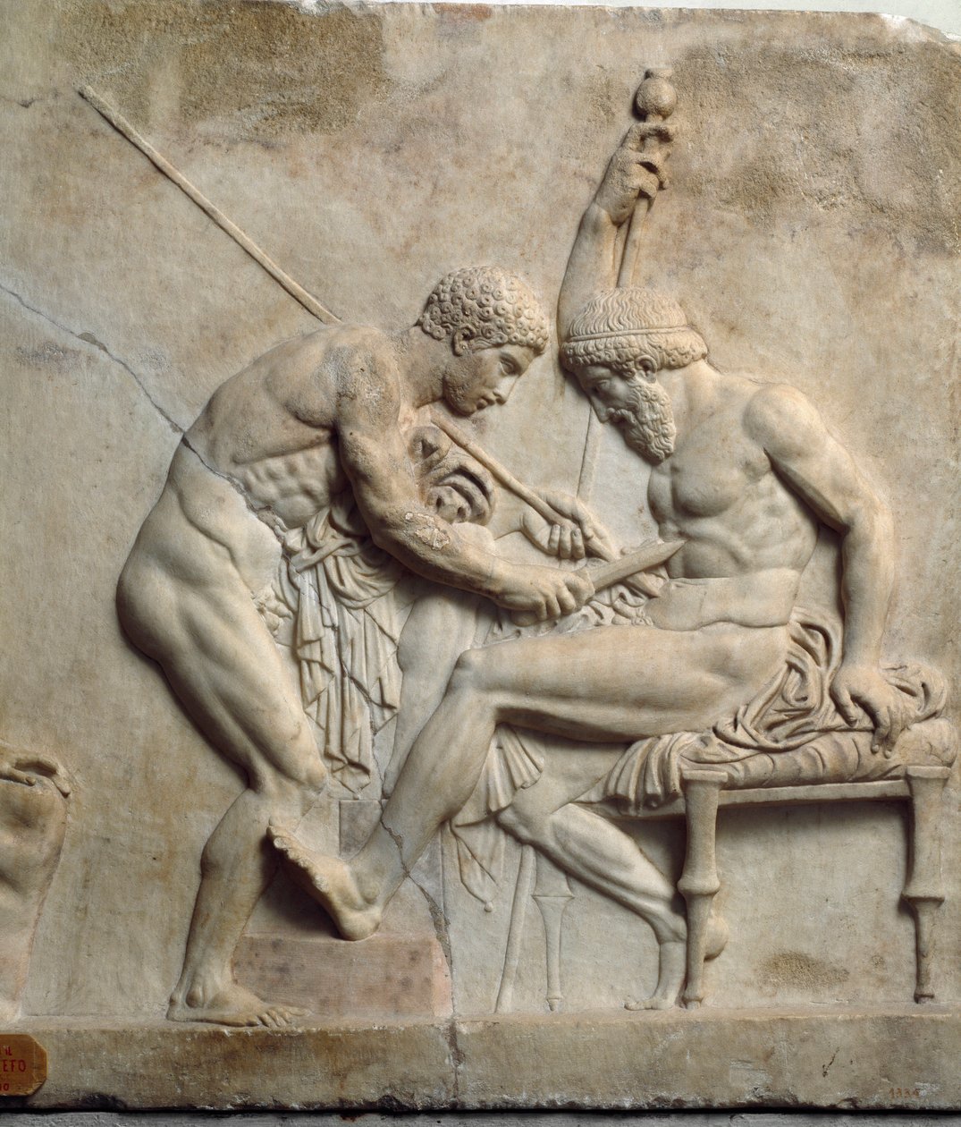 Neo-attisk kunst (neo loftsrum): relief, der repræsenterer Telephus (Telephus) betjent af en kirurg - 1. århundrede f.Kr., Fra Ercolano (Herculanum) - Napoli, Museo Archeologico Nazionale - Telephus (eller Telephos) behandlet af en kirurg - Relief af Roman