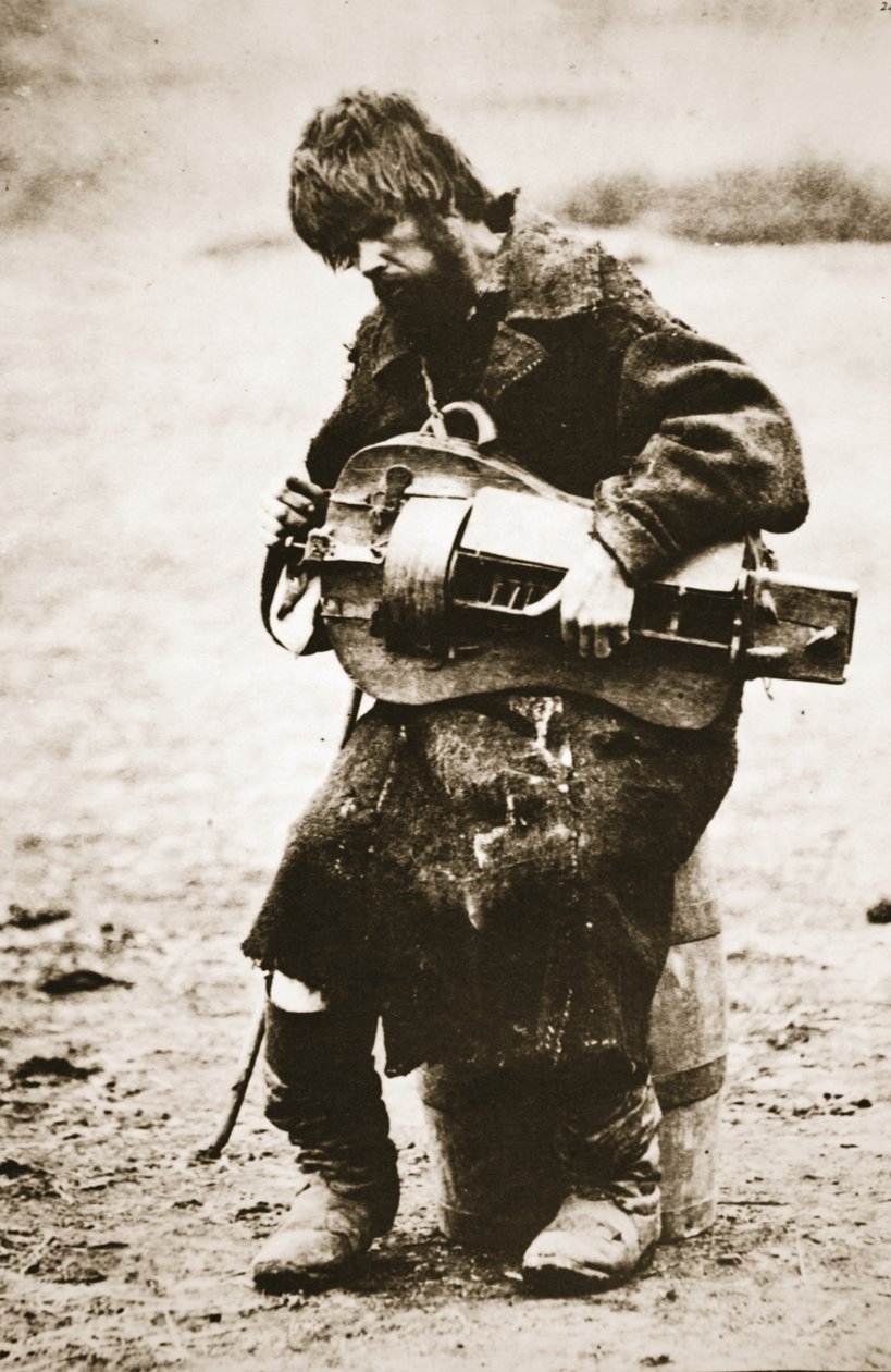 Russisk bonde spiller gurdy, ca. 1880