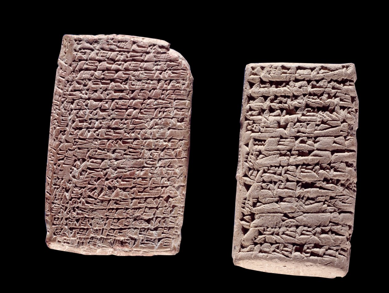 Mesopotamie: Assyriske tabletter (til venstre) af en handelsaftale (19. eller 18. århundrede f.Kr.) og babyloniske tabletter (højre) af en salgskontrakt af et hus (mellem det 20. og 16. århundrede f.Kr.) indgraveret med inskription i Cuneiform. Paris, Brie af School Assyrian