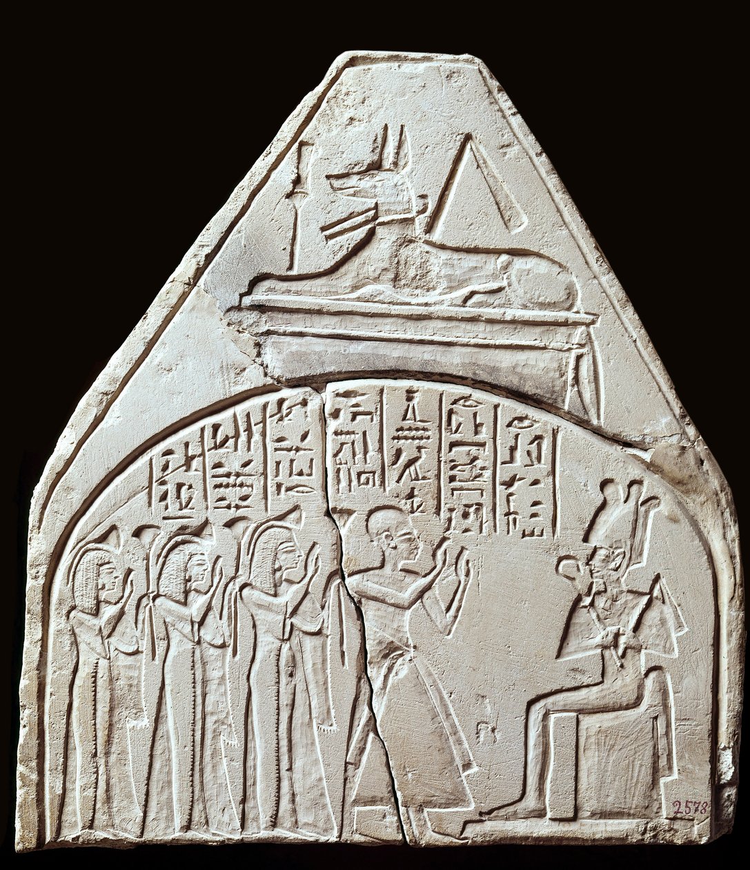 Egyptisk antikvitet: stelefragment, der repræsenterer tilbedelsen af guden Osiris. Ovenfor repræsenterer det Anubis. Paris, Louvre-museet af School Egyptian