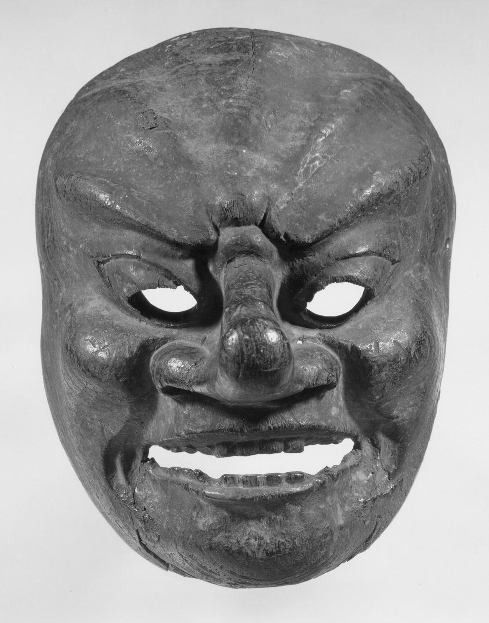 Bugaku Mask (træ med rester af røde og sorte pigmenter) af Japanese School