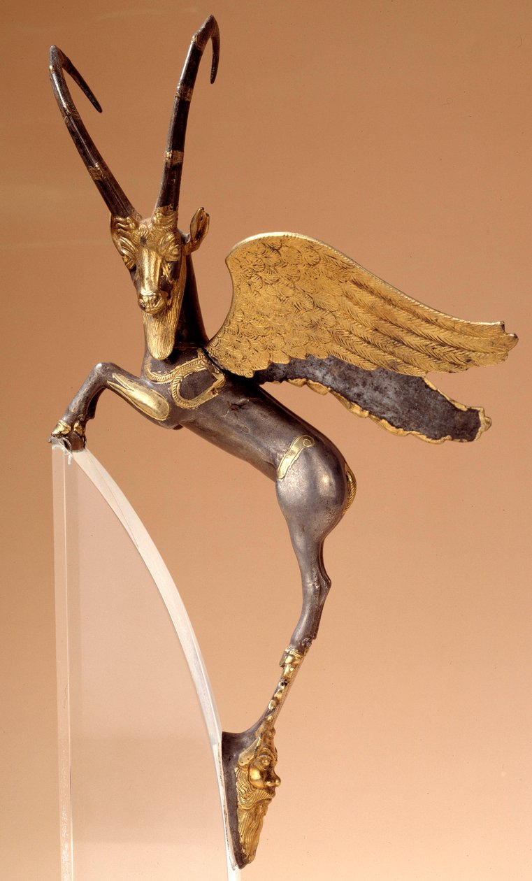 Apparathåndtag: sølvvinge stenbuk, indlagt, guld. Persisk periode routenide (6.-4. århundrede f.Kr.), kommer fra Iran. Paris, musee du Louvre - Ceremonielt håndtag: bevinget stenbuk i sølv, indlagt, guld. Achaemenid persisk periode (6.-4. århundrede f.Kr.) af School Persian