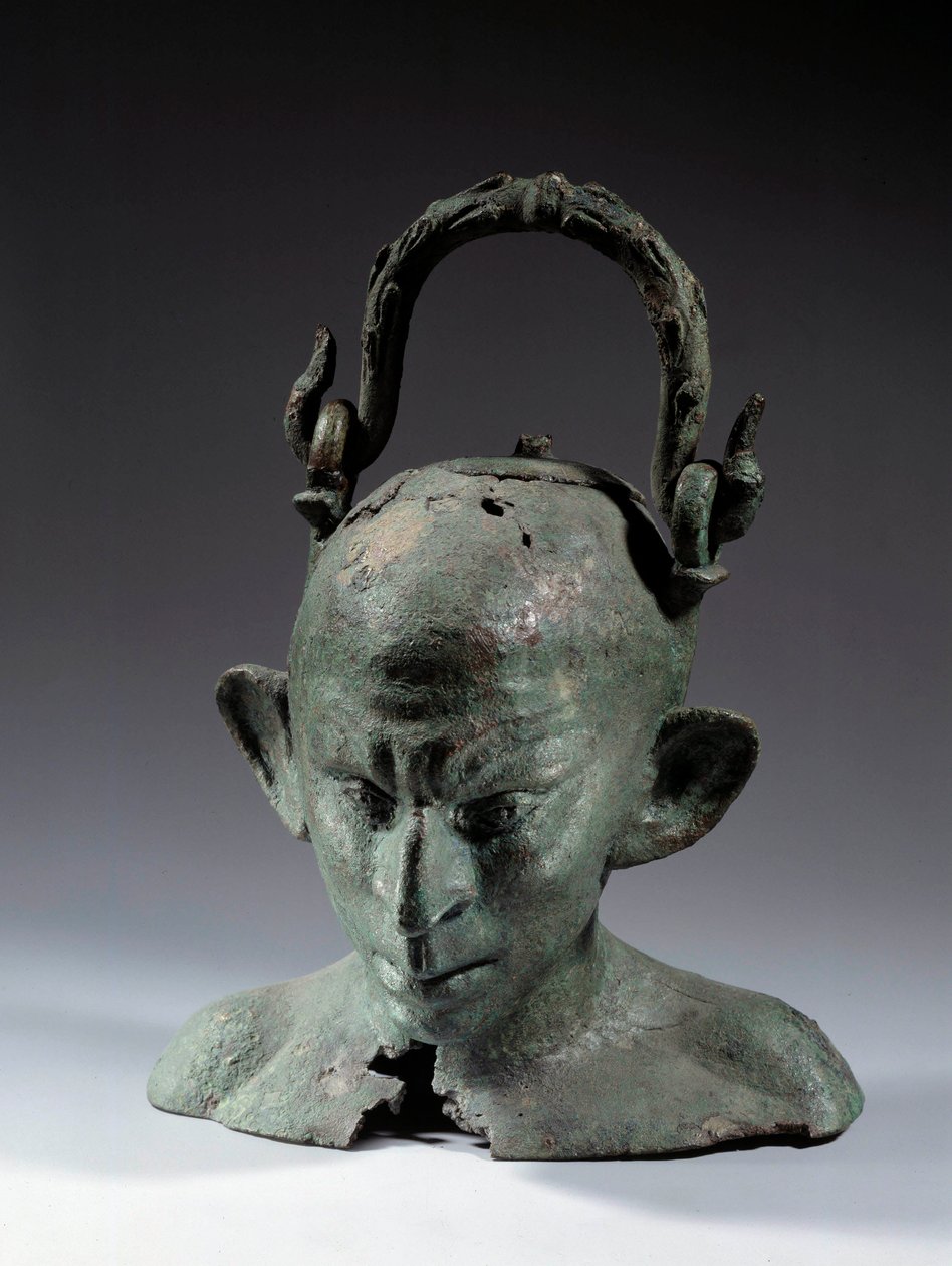 Hovedformet vase i bronze: buste af syrisk slave (?). 2. eller 3. århundrede efter JC. Søn 0,19 m Paris, Musée du Louvre af School Syrian