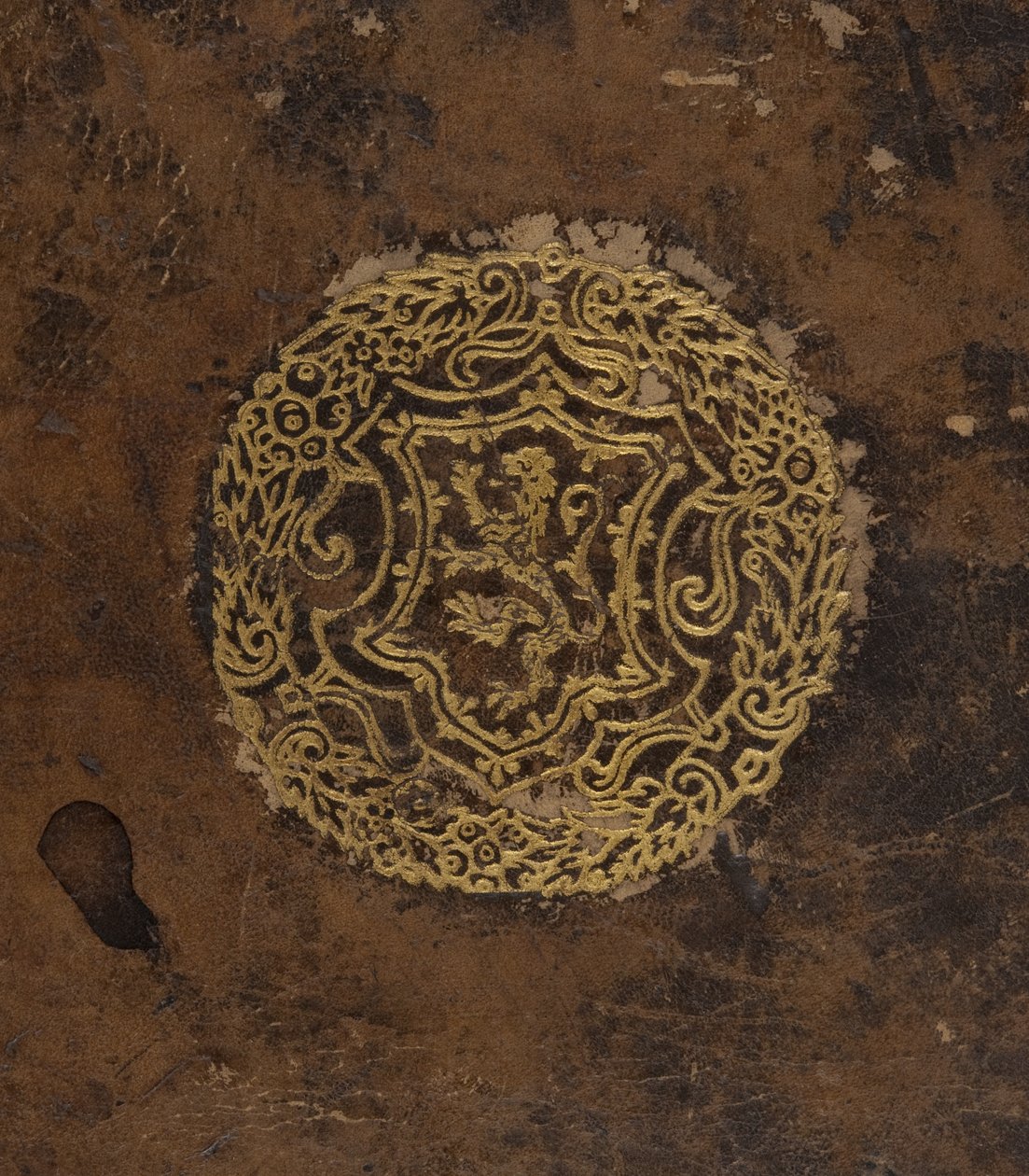 Cosmographia, coverdetalje (læder) af Sebastian Munster