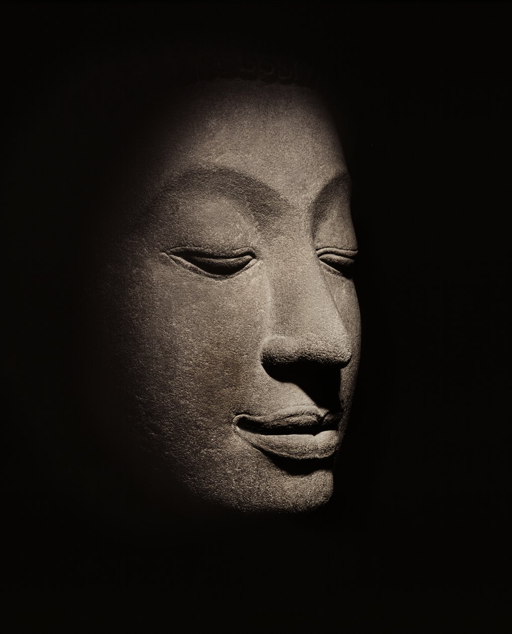 Buddha-hoved fra den tidlige Ayutthaya-periode af Siamese School
