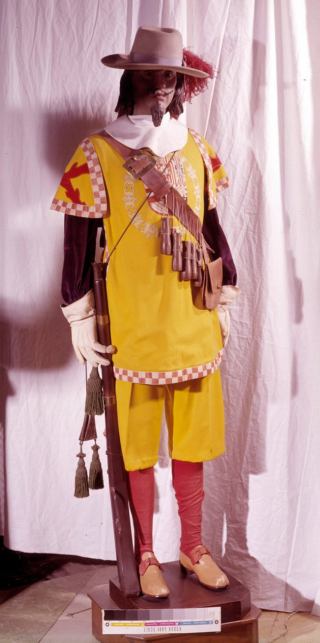 Harquebush-kostume på Filip II af Spaniens tid (1527-1598). Dukken holder en harquebush i hånden og bærer en skulderrem, hvortil ammunitionen (pulver til riflen) er fastgjort. Armee-museet i Madrid af Spanish School