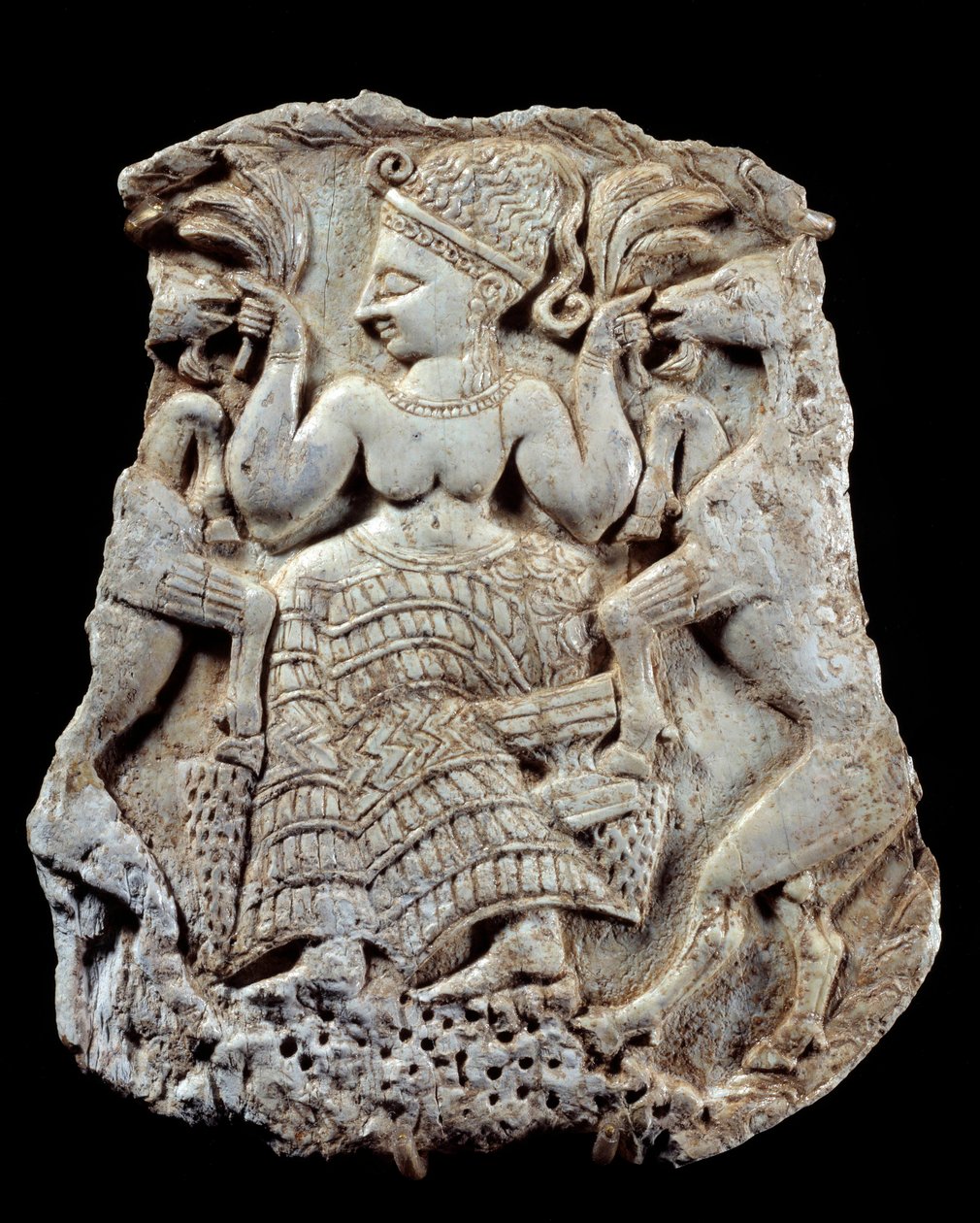 Udskåret elfenbenslåg: Mycensk gudinde for fecondite som dyremester. Fra Twink El Beida, Syrien. 13. århundrede f.Kr. Paris, Louvre-museet af Syrian Syrian
