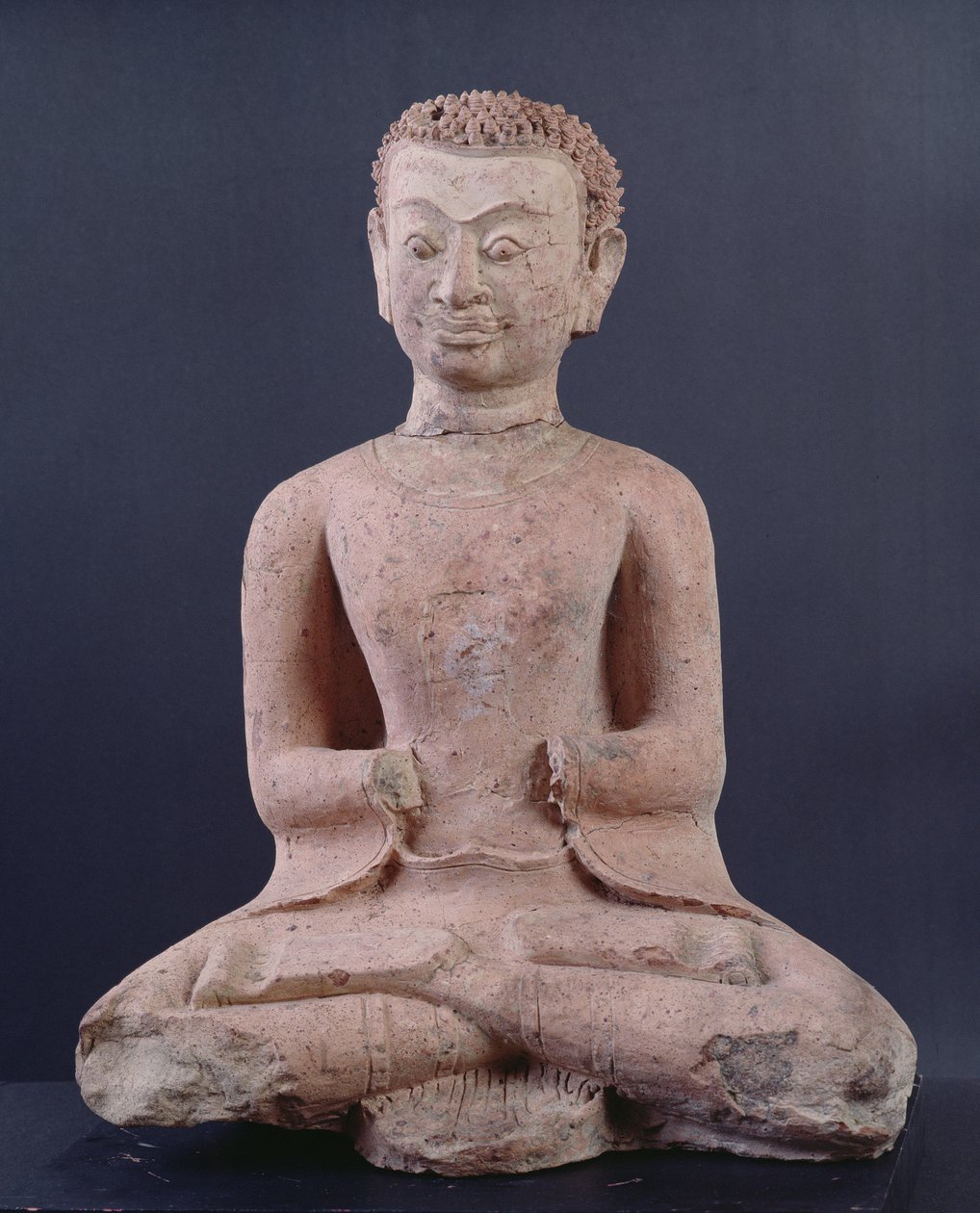 Discipel i tilbedelse (terracotta) af Thai School