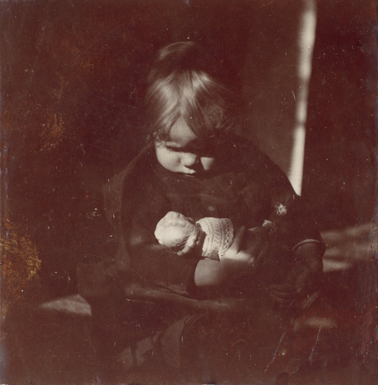 Betty Reynolds med Doll on Lap, ca. 1885. af Thomas Eakins