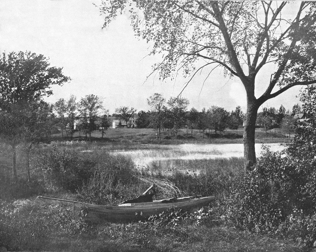 En bugt i Lac la Belle, Oconomowoc, Wisconsin, USA, c1900. af Unbekannt