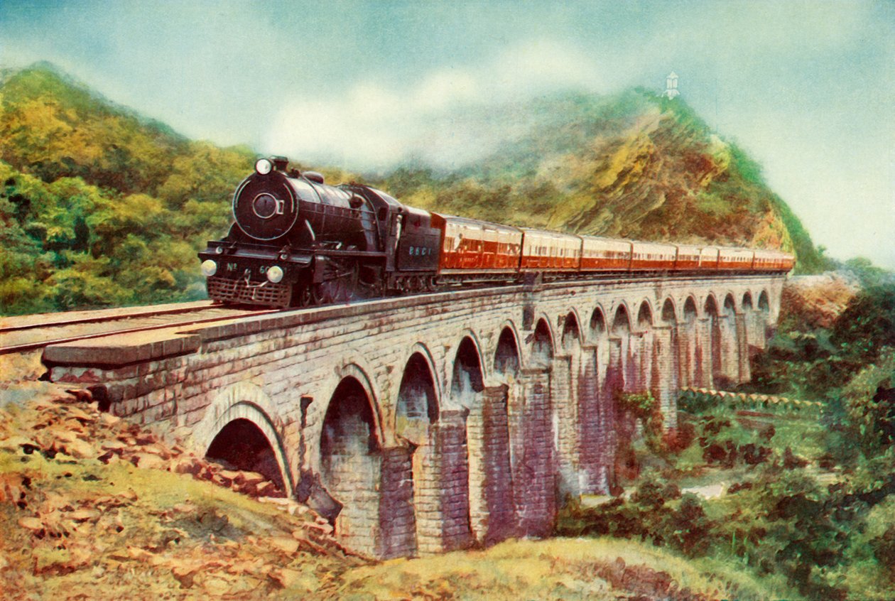 Mellem Bombay og Delhi. Et slående billede af Frontier Mail, der passerer over en viadukt, 1935 af Unbekannt