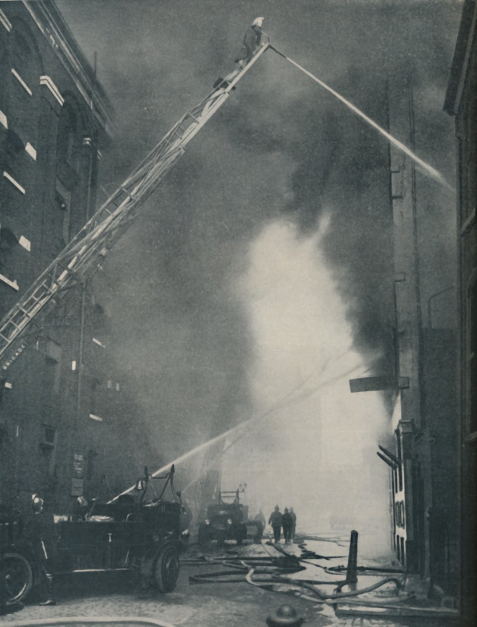 Massed Forces of the Modern Fire-Fighter Pitted Against a City Blaze, c1935 af Unbekannt