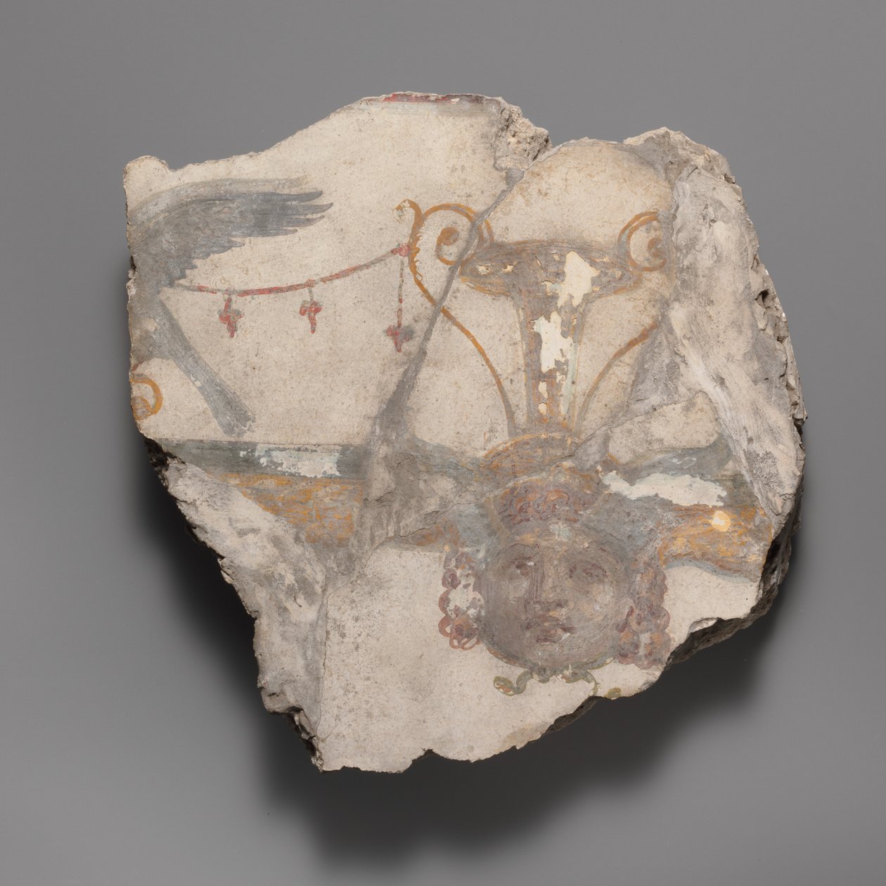 Vægmaleri fragment med Gorgon maske, ca. 14-68 e.Kr. af Unbekannt