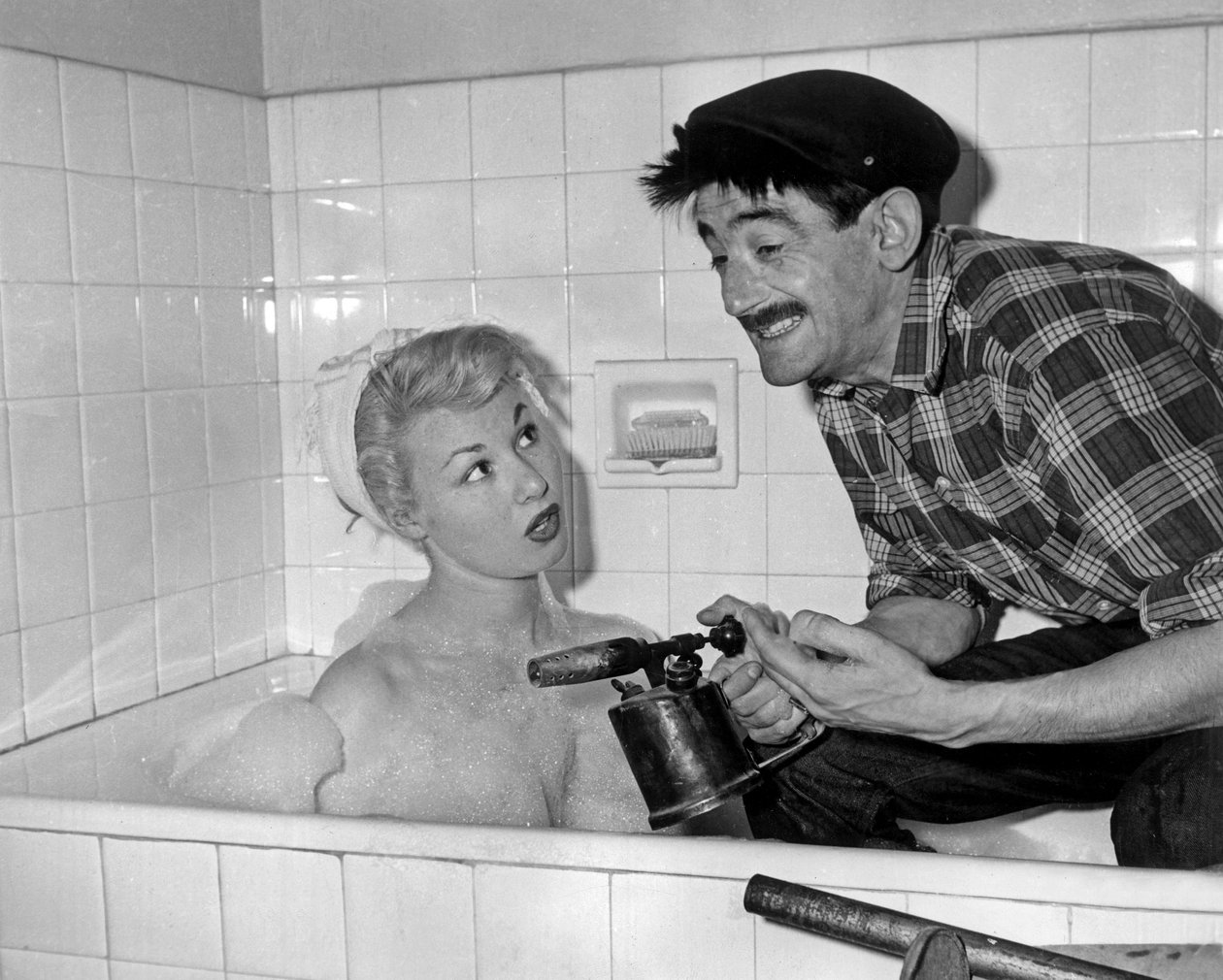 Nadine Tallier (nu baronesse Nadine De Rothschild) og Maurice Gardett under aftenen hjemme i Paris den 27. marts 1961 af Unbekannt Unbekannt