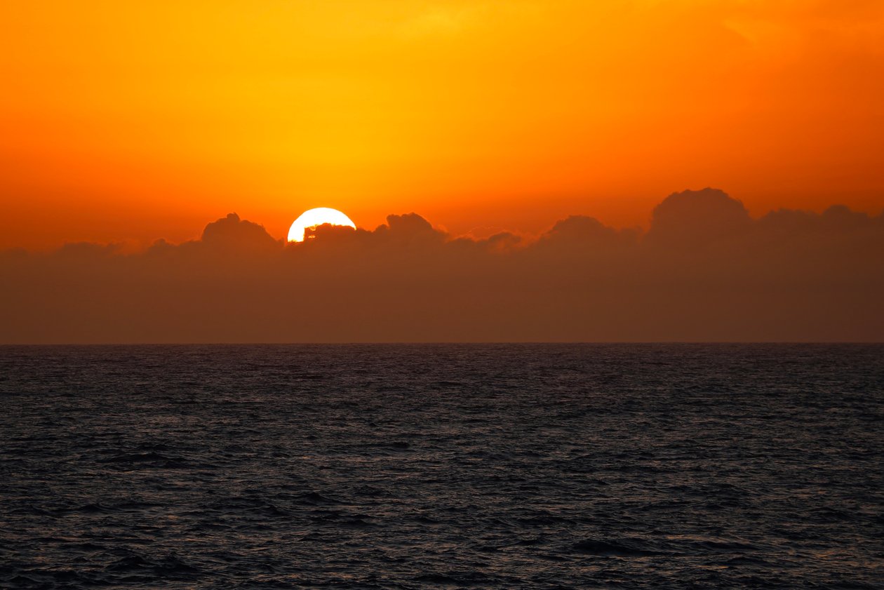 Solnedgang gennem skyerne, 2018 af Unbekannt Unbekannt