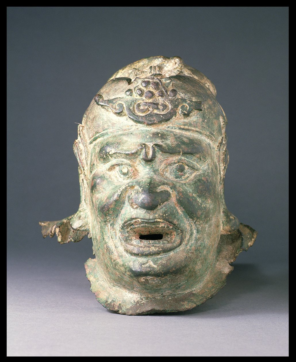Hovedet af en vogterfigur, fra indgangen til en grav eller et tempel, muligvis et `dvarapala
