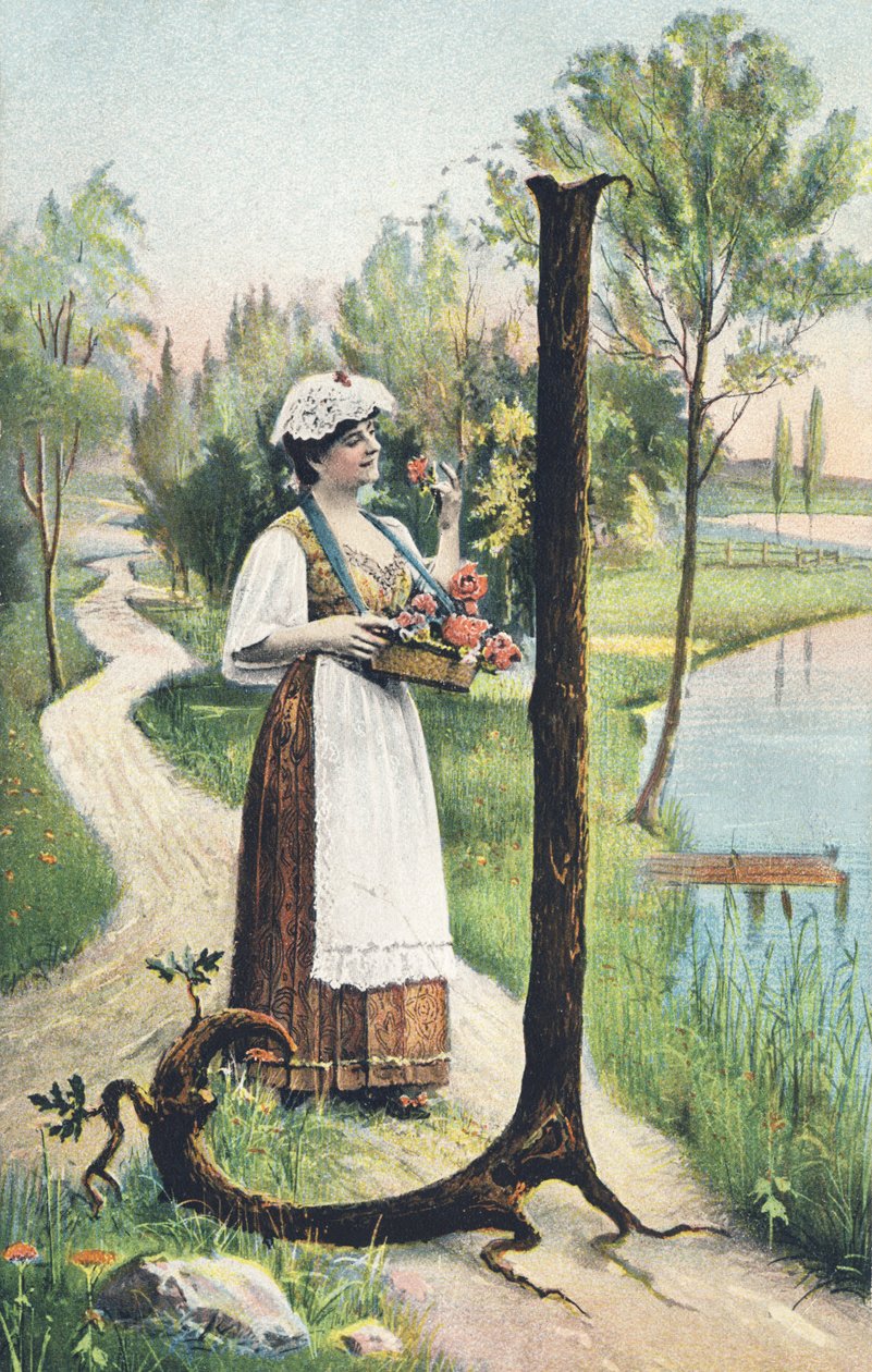 J: En stående kvinde i lang nederdel, forklæde og overdel bærer en kurv med blomster. Landeindretning - Alfabettegn Ref Th. E., L. Theochrom - Serie 994. Theodor Eisman, udgiver, Leipzig af Unbekannt
