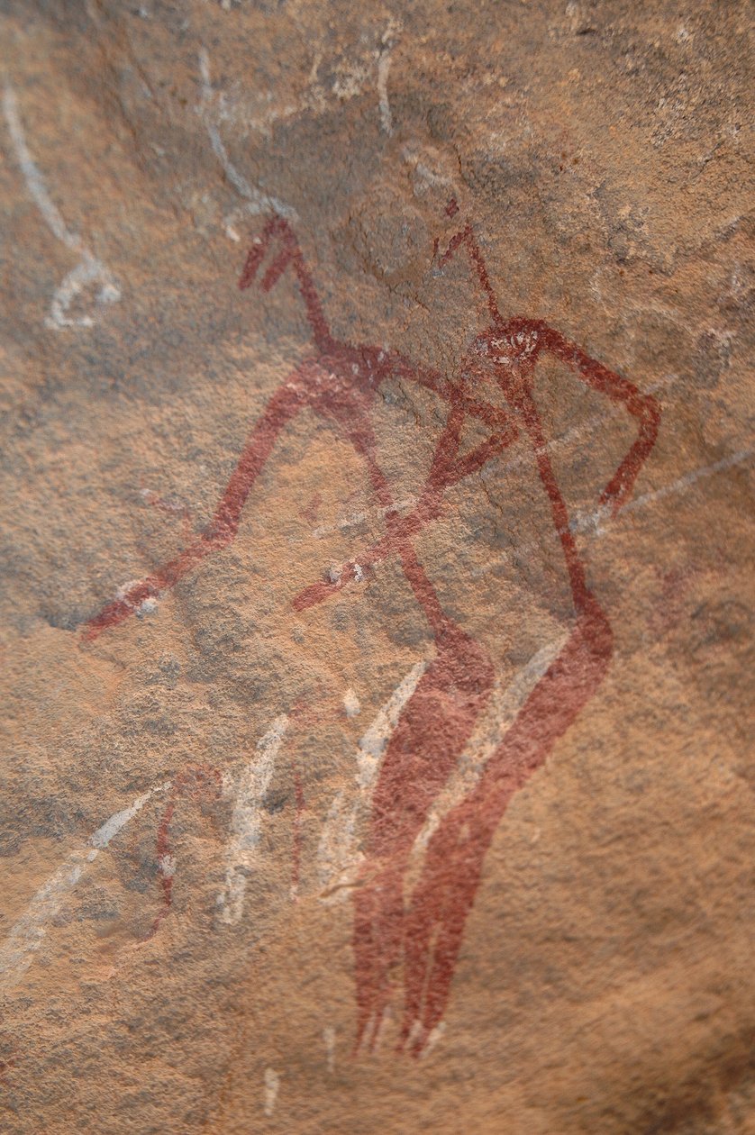 Klippekunst, forhistorie: Klippemaleri af to longiline-figurer i et udsmykket husly i Uweinat-bjergene, Sudan. Periode fra 8000 til 3000 år f.Kr. Fotografering af Unbekannt
