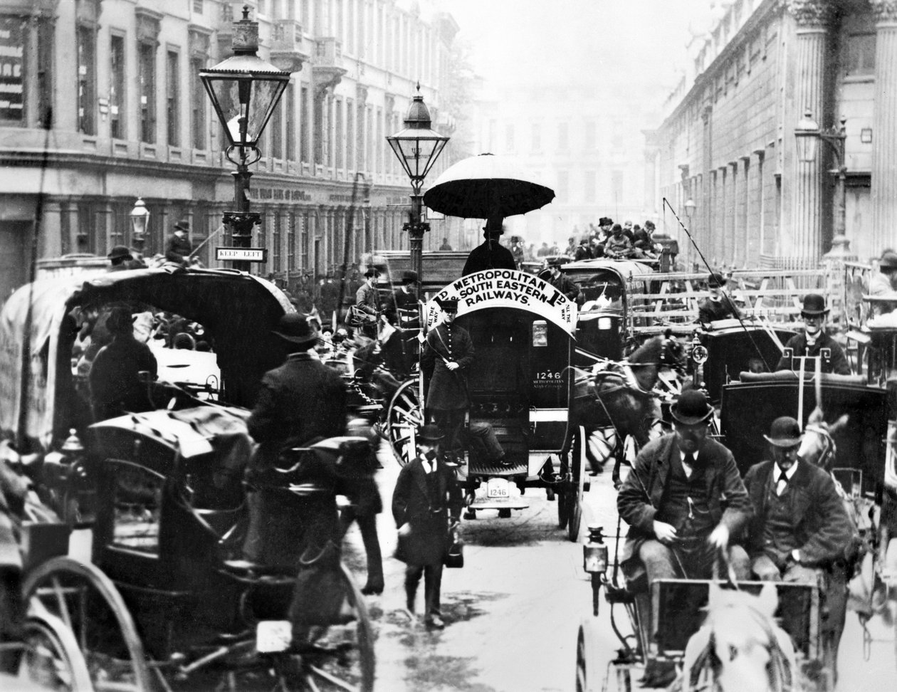 Storbritannien: En travl scene på banken, der viser Metropolitan og South Eastern Railways Bus. London, c1878 af Unbekannt