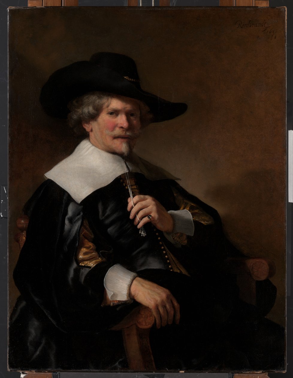 Portræt af en mand siddende i en lænestol af Unknown