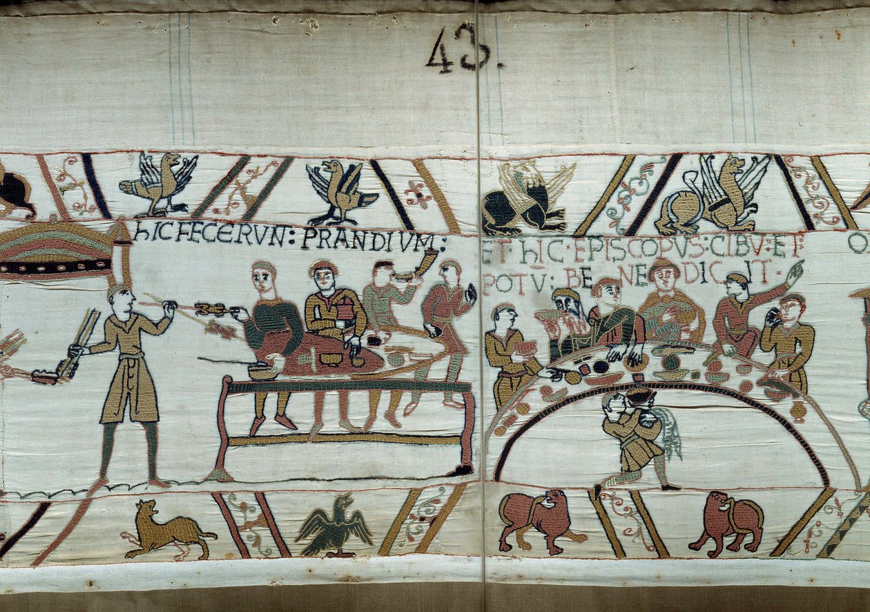 Debarques i England laver Vilhelm Erobrerens (1027-1087) våben en fest, mens de venter på at bekæmpe Harold IIs saksiske våben. Guillaume er omgivet af baroner og Eveque Odon-detaljen af Bayeux-tapetet eller broderi af dronning Mathilde af Unknown artist