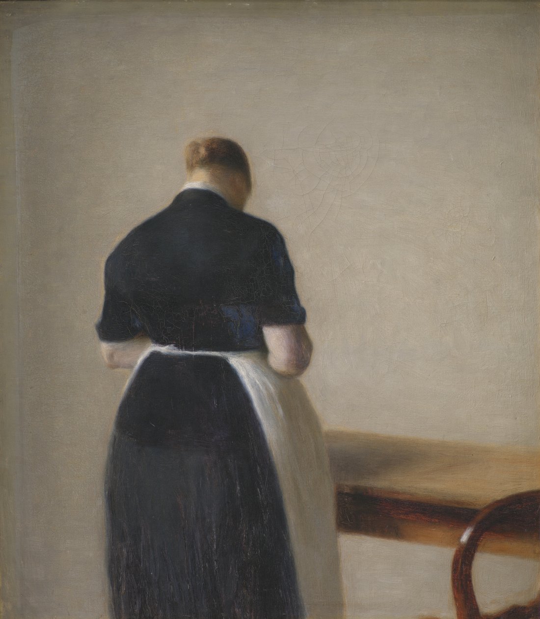 Kvinde set bagfra af Vilhelm Hammershoi