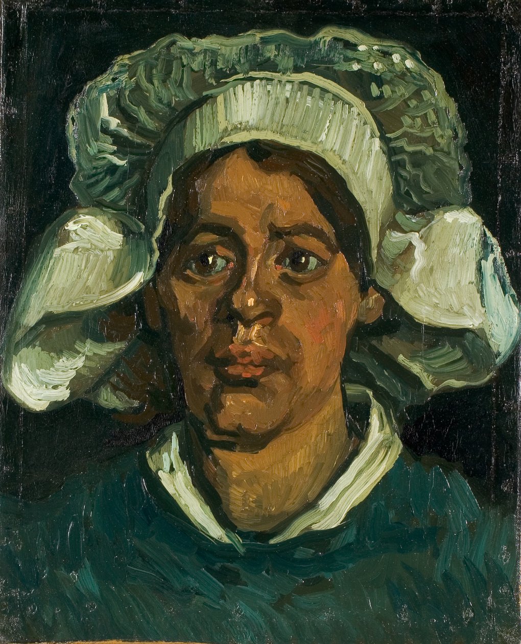 Hoved af en bondekvinde iført hvid hætte, 1884-1885. af Vincent van Gogh