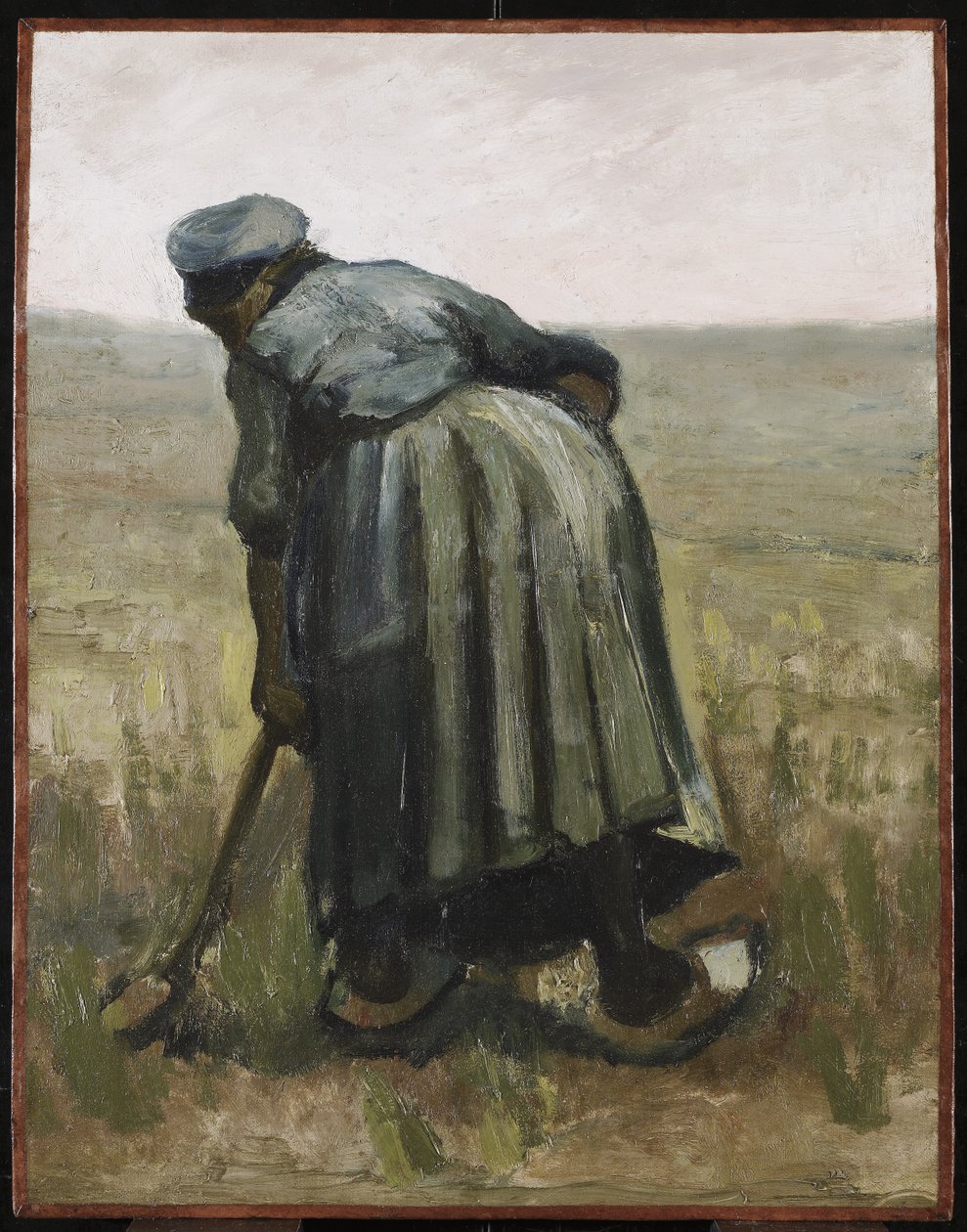 En kvinde med en spade, set bagfra, 1885 (olie på lærred på træpanel) af Vincent van Gogh