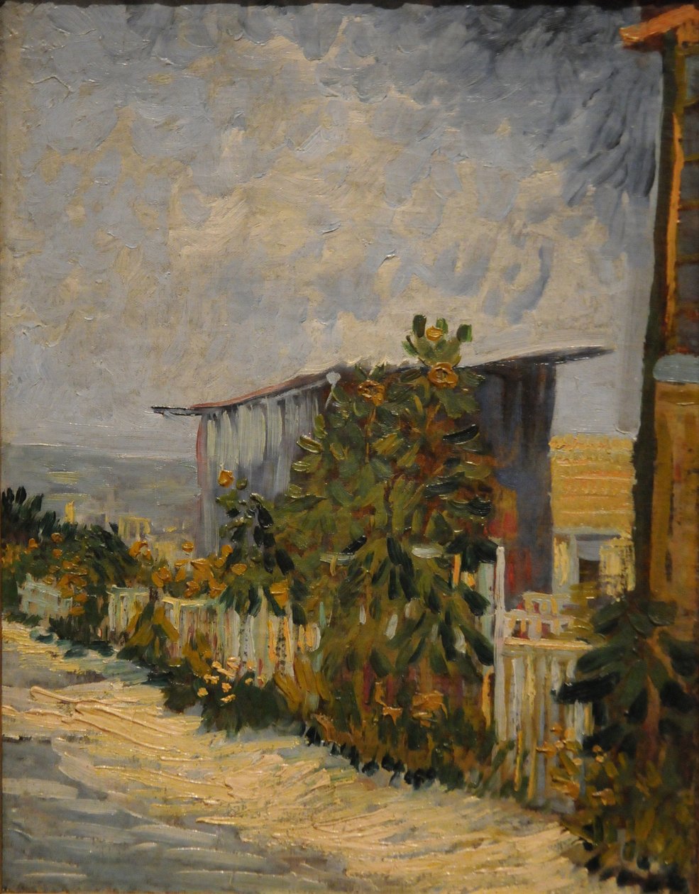 Skur ved Montmartre med solsikke, 1887 af Vincent van Gogh