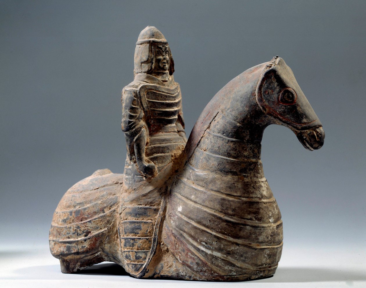 Kinesisk kunst: statuette af rytter i rustning (206 f.Kr.-220 e.Kr.), Han-perioden. Paris Museum Cernuschi af Western Han Dynasty Chinese School