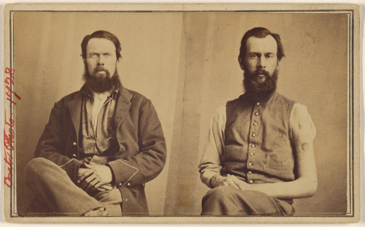 [To uidentificerede ofre for borgerkrigen sidder]. af William H. Bell