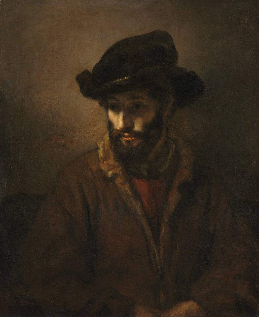 En skægget mand iført hat af Workshop of Rembrandt