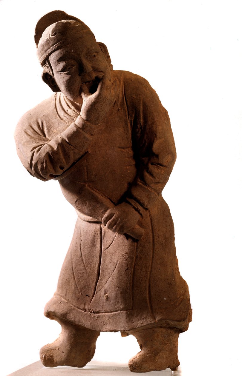 Kinesisk kunst: statuette af terracotta, der repræsenterer en "whistler"-skuespiller. Fra Tsiao Tsouo, Honan. Yuan-dynastiet (1271-1368 e.Kr.). af Yuan Dynasty Chinese School