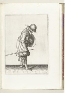 Skjold- og piggeøvelsen: Soldaten sætter piggen på jorden ved siden af ​​sin højre fod (nr. 16), 1618 Nassausche Wapen-Handelinge, van Schilt, Spies, Rappier and the Targe: beyde figuerlick afbildet, og indrammet efter den nye orden [af] (...) M af Adam van Breen