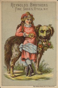 Pige læner sig op ad stor hund med roser. af American School