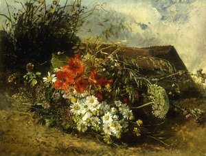 Vilde blomster på en bank, med et sommerhus bagved