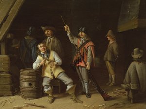 En soldat renser en musket