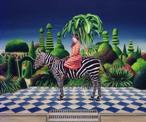 Dame på en zebra