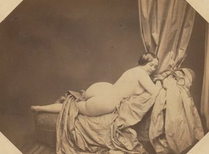 Akademisk nøgen, tilbagelænet på en sofa, ca. 1855.
