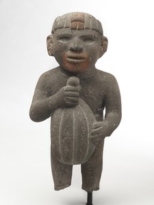 Mand med en kakaopæl, 1440-1521 (vulkansk sten med spor af rødt pigment)
