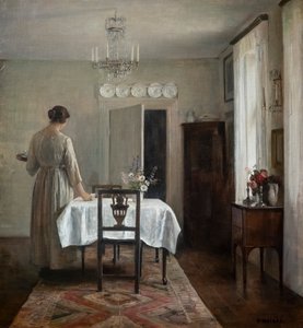Kunstnerens kone dækker bordet