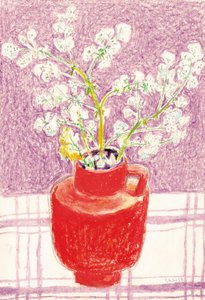 Lyse blomster i rød vase