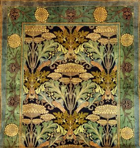 Et Donegal uldtæppe med blomsterdesign, ca. 1903 (uld)