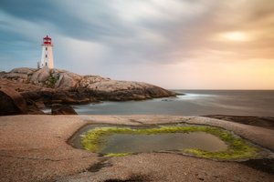 Solnedgang ved kystfyrtårnet af Christoph Schaarschmidt