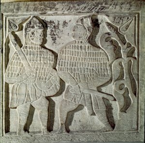Seljukide-kunst (Seljukide eller Saljuqide): lavt relief, der repræsenterer to krigere. Fra Konya, Tyrkiet. 13. århundrede. Tyrkisk islamisk kunstmuseum, Istanbul