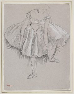 Danser justerer sin tøfler af Edgar Degas